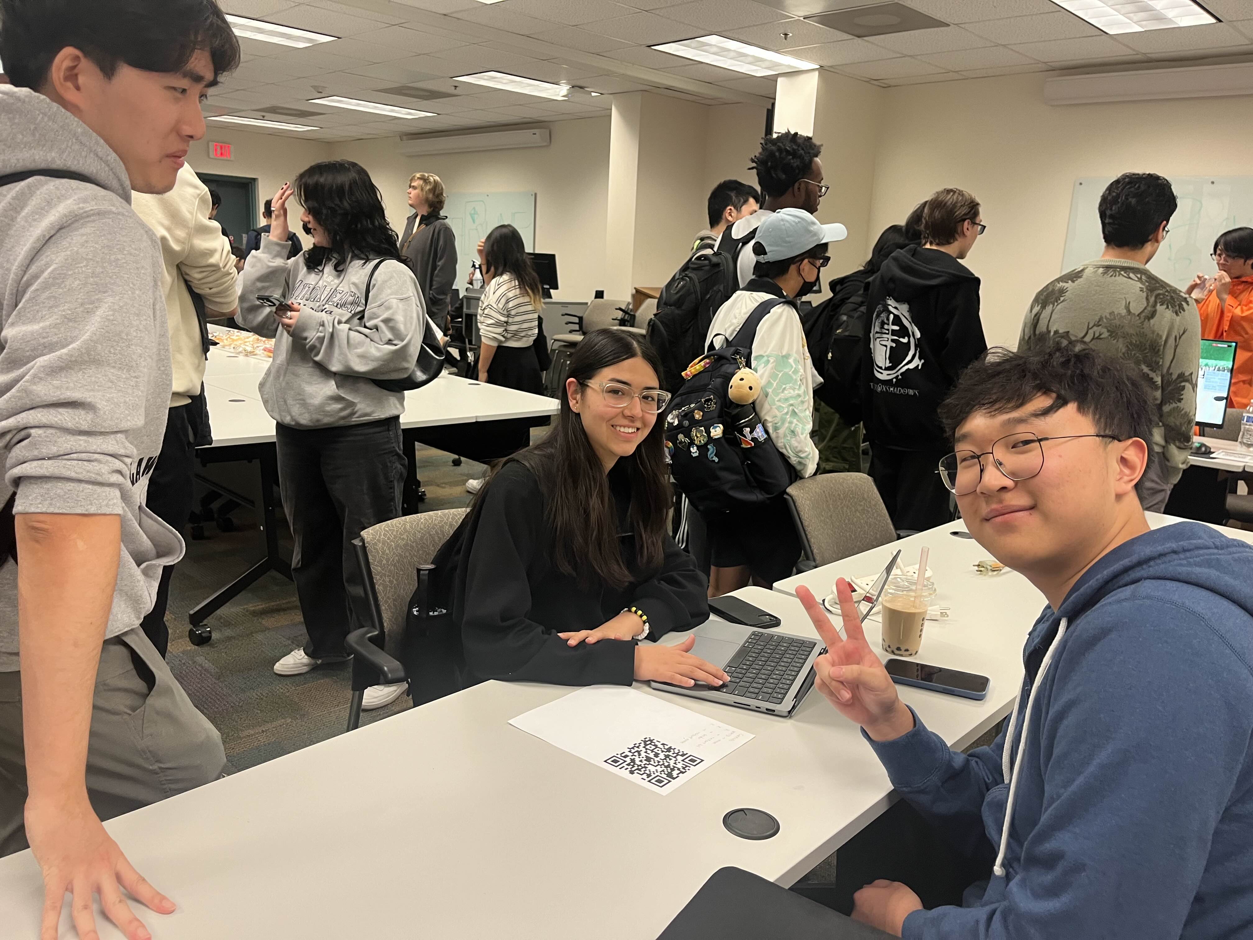 Students playing and discussing Shiftscape during a production playtest